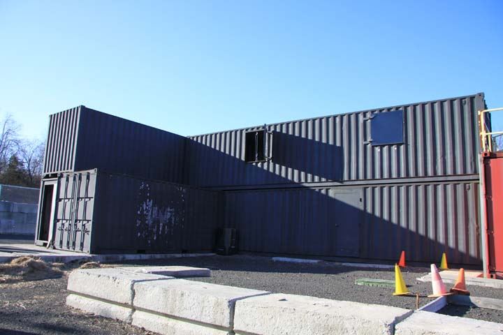 Black corrugated metal Training Facility Exterior