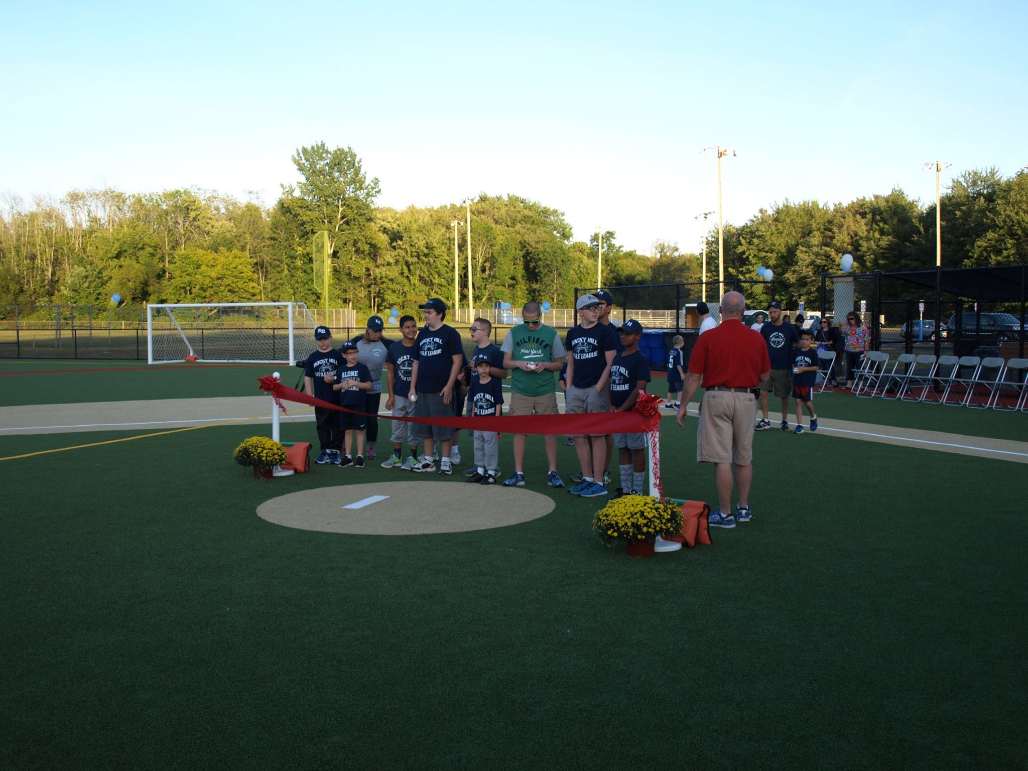 Ribbon Cutting Event on a Baseball Field